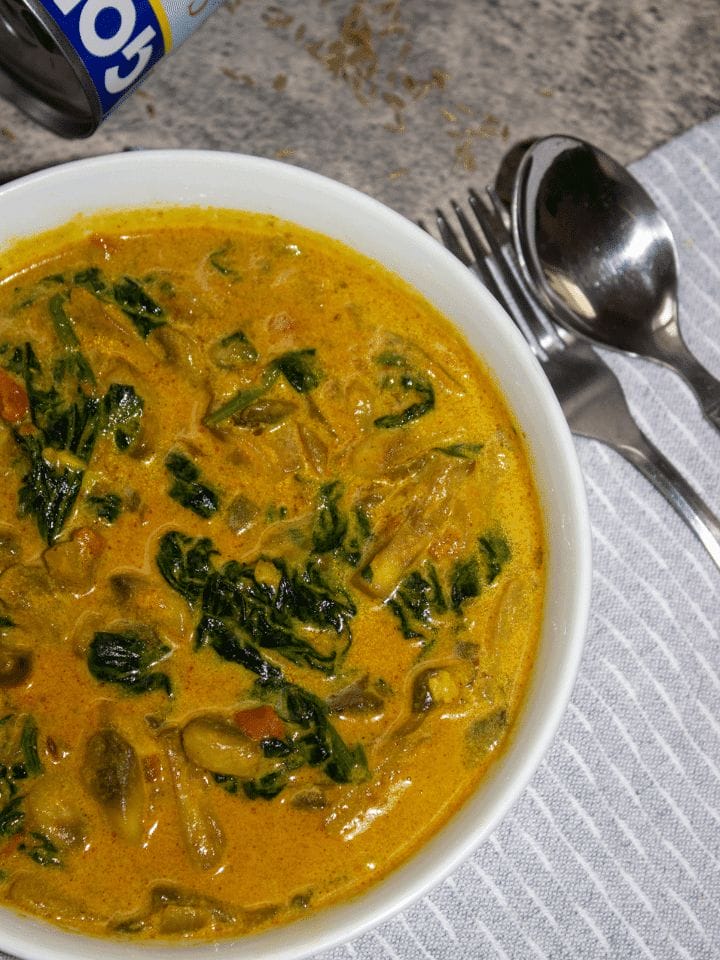 Mushroom spinach curry with coconut milk.